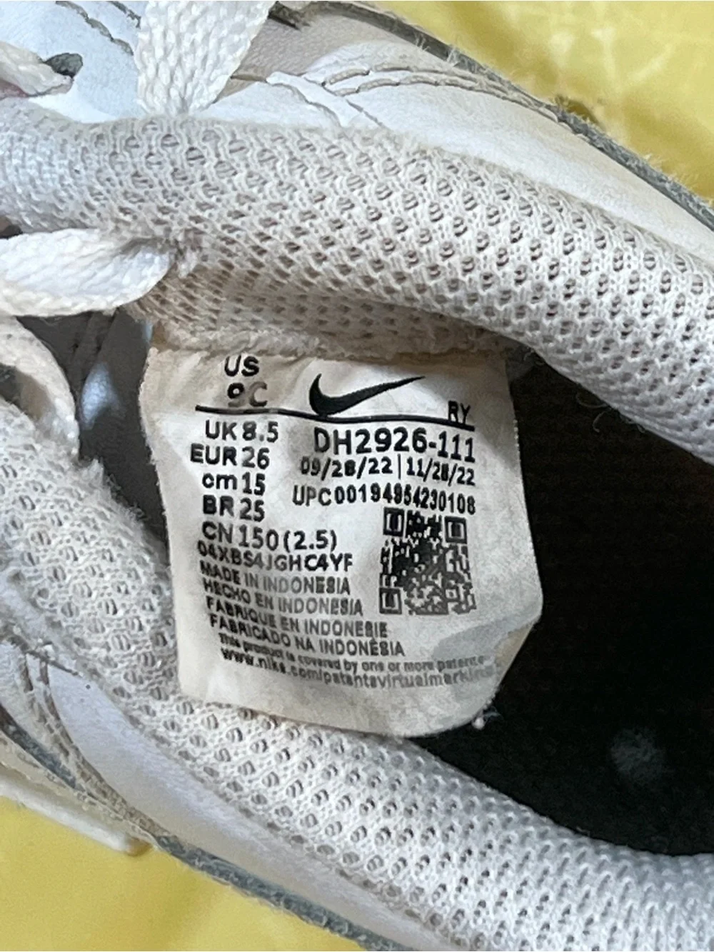 Nike Kids White Lace-Up Sneakers with Subtle Red Accent